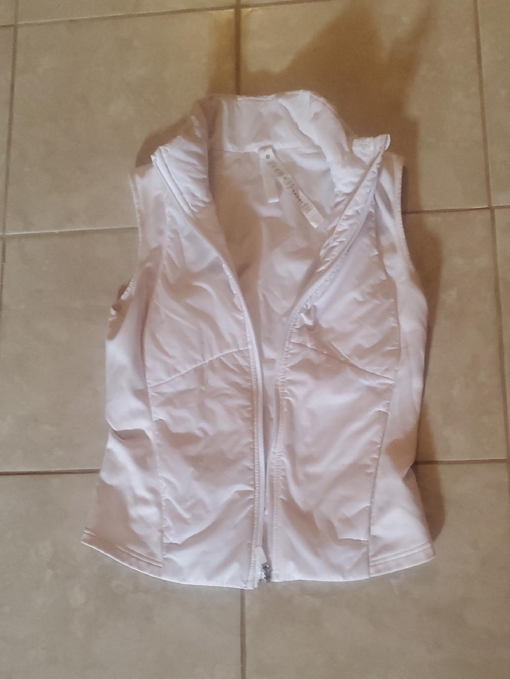lululemon athletica white sleeveless zip-up vest